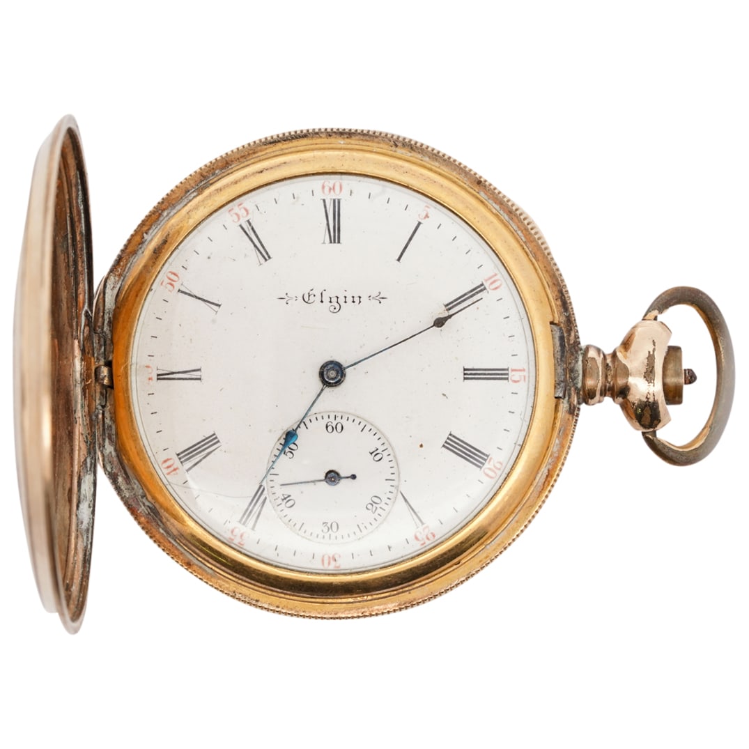 American Elgin 14K 25 Year Superior Gold Pocket Watch: DESCRIPTION: Elgin 14K gold pocket watch featuring a face emblazoned "Elgin" and distinguished with a seconds dial and sporting an etched movement. Marked within back cover "Guaranteed Essex 14K Super