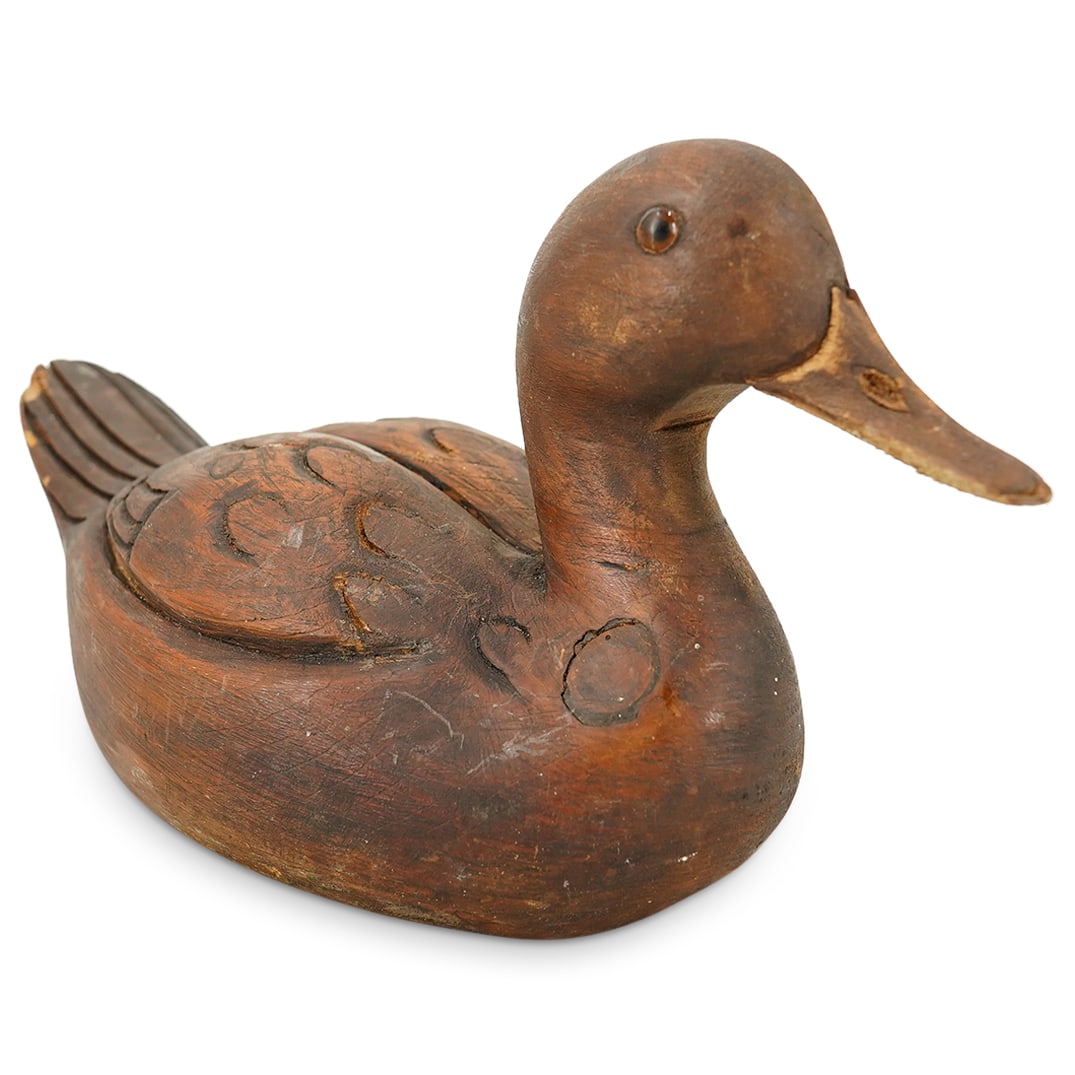 Elton Henning (American, 1943-2020) Carved Wood Duck Decoy: DESCRIPTION: Carved wood duck decoy by Elton Henning featuring plastic or glass eyes. Marked with "Elton Henning" at underside of tail. CIRCA: Late 20th - early 21st century ORIGIN: American DIMENSION