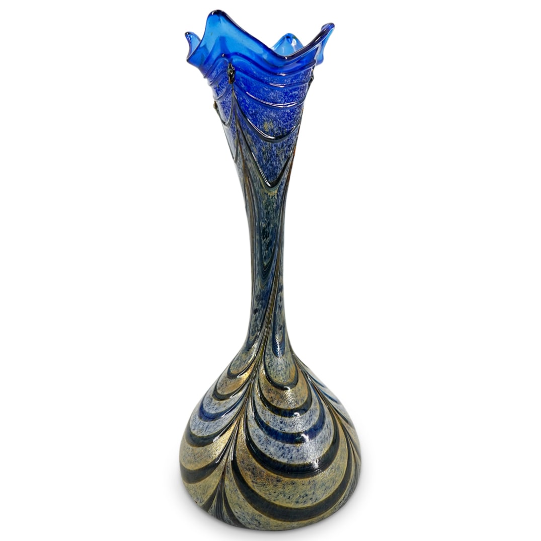 Iridescent Art Glass Vase: DESCRIPTION: Art glass vase featuring applied decoration, irregular lip, and areas of mottled and iridescent glass. CIRCA: 20th century ORIGIN: Unknown DIMENSIONS: H: 9.25" Diameter: 3.5" CONDITION: G