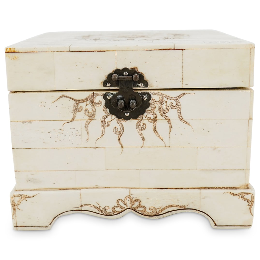 Bone Inlaid Tessellated Hinged Treasure Box: DESCRIPTION: Bone inlaid tessellated hinged treasure box designed with a square form, supported on a footed base, and further embellished with contrasting etched decorative motifs. CIRCA: 20th Century