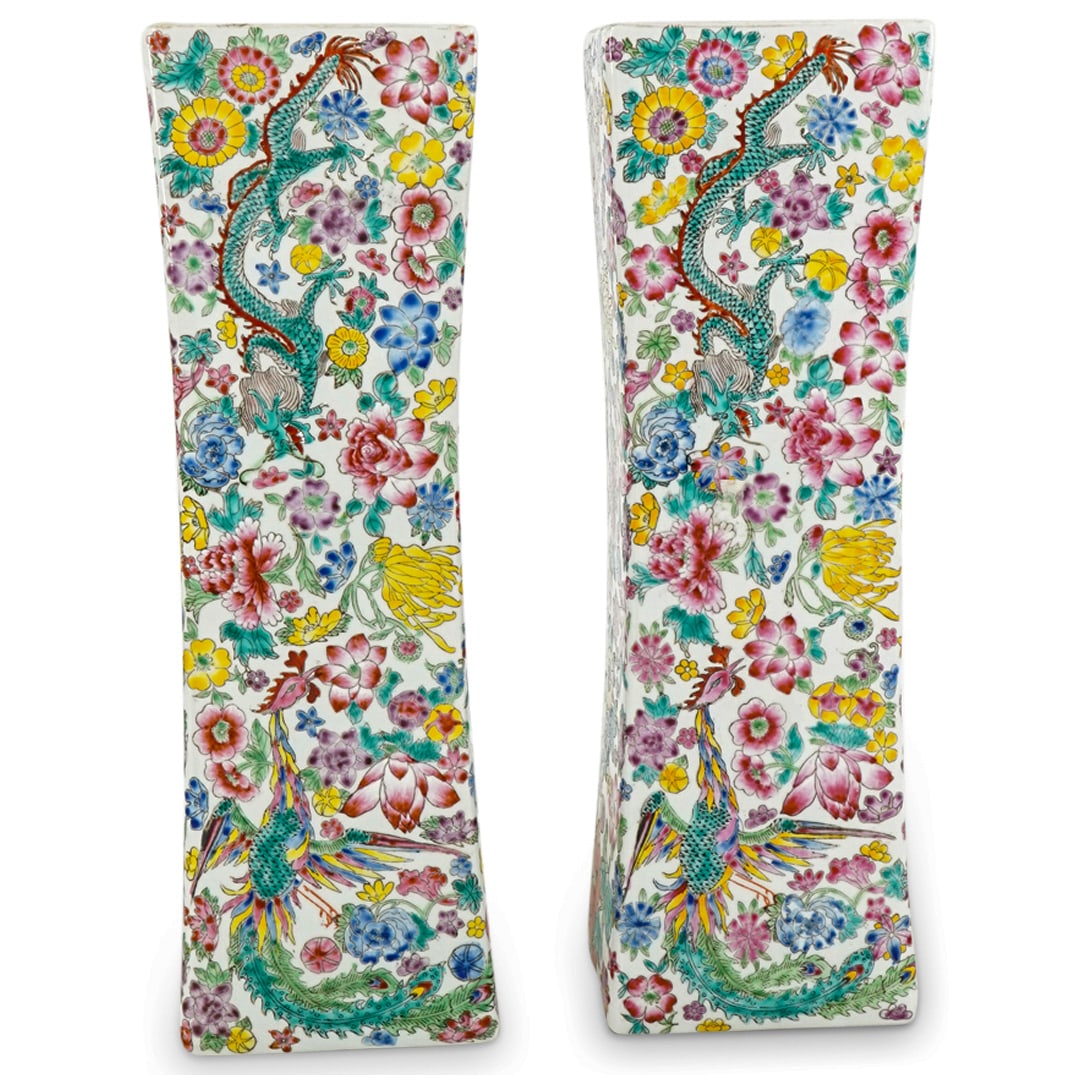 Antique Chinese Porcelain Pillows: DESCRIPTION: A pair of antique Chinese Porcelain pillows with polychrome floral decoration with dragon and phoenix motifs. CIRCA: 20th Century ORIGIN: China DIMENSIONS: H: 3.25" x W: 4.25" x L: 13.5" 