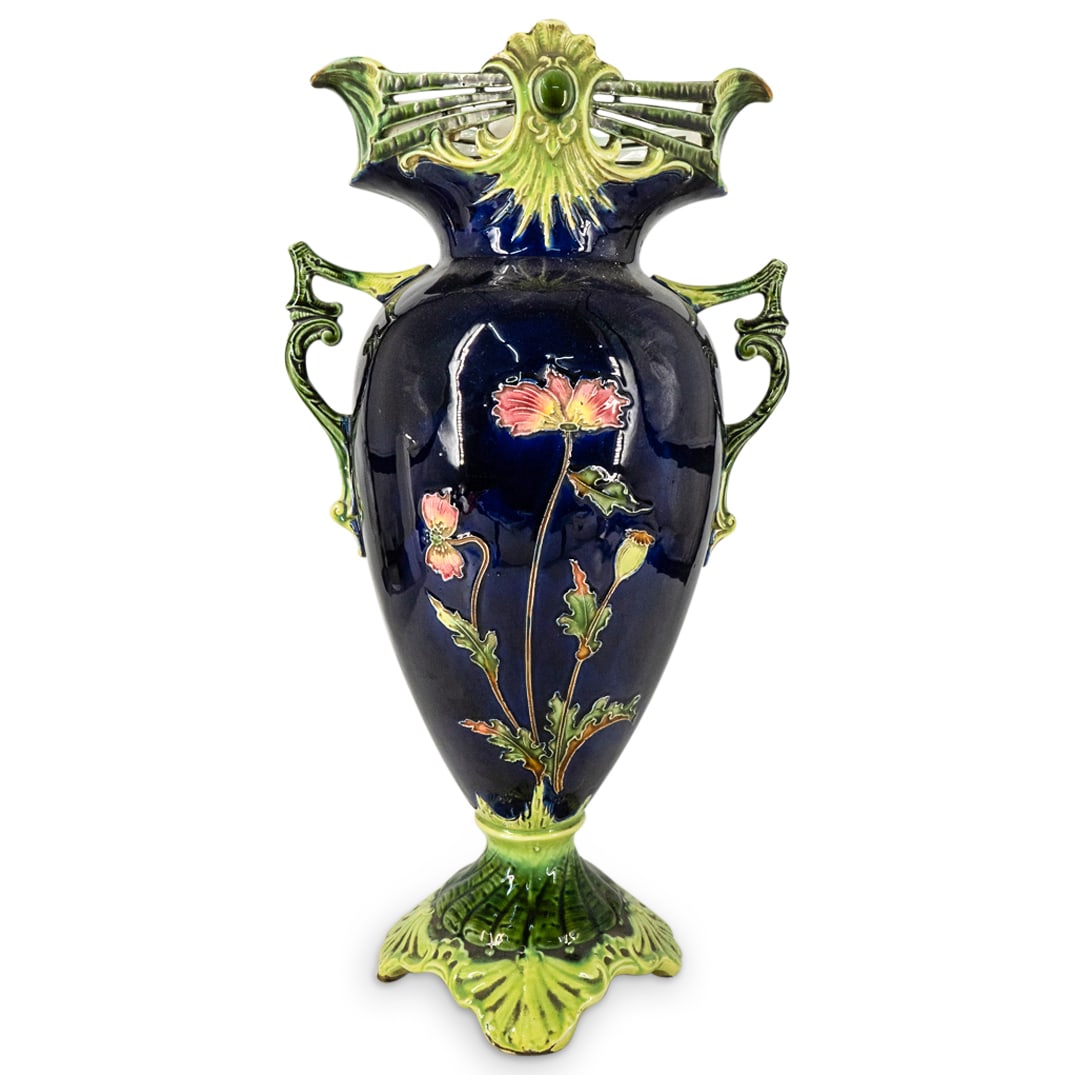 Art Nouveau Josef Strnact (1881-1934) Majolica Vase: DESCRIPTION: Art Nouveau porcelain vase by Josef Strnact featuring a majolica glaze, floral motifs, and open-work lip and handle designs. Hallmarked on underside with "JS" in shield. CIRCA: Early 20th
