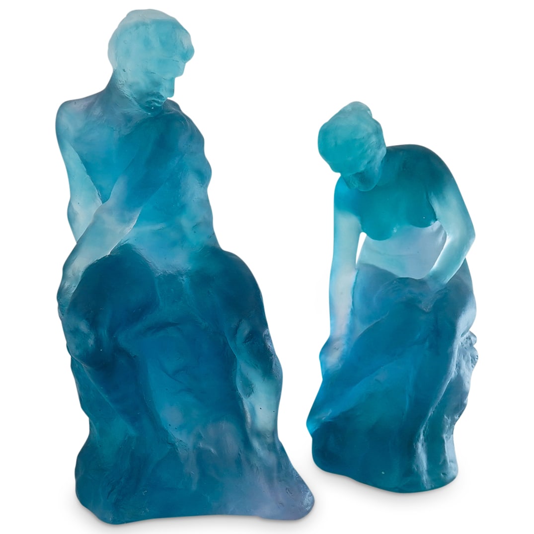 (2 Pc) Pate-De-Verre Blue Male & Female Nude Sculptures: DESCRIPTION: (2 Pc) Blue Pate-De-Verre Male and Female Nude Sculptures in the manner of Daum. This set includes: one (1) male sculpture, seated with his torso twisted to one side; and one (1) seated f