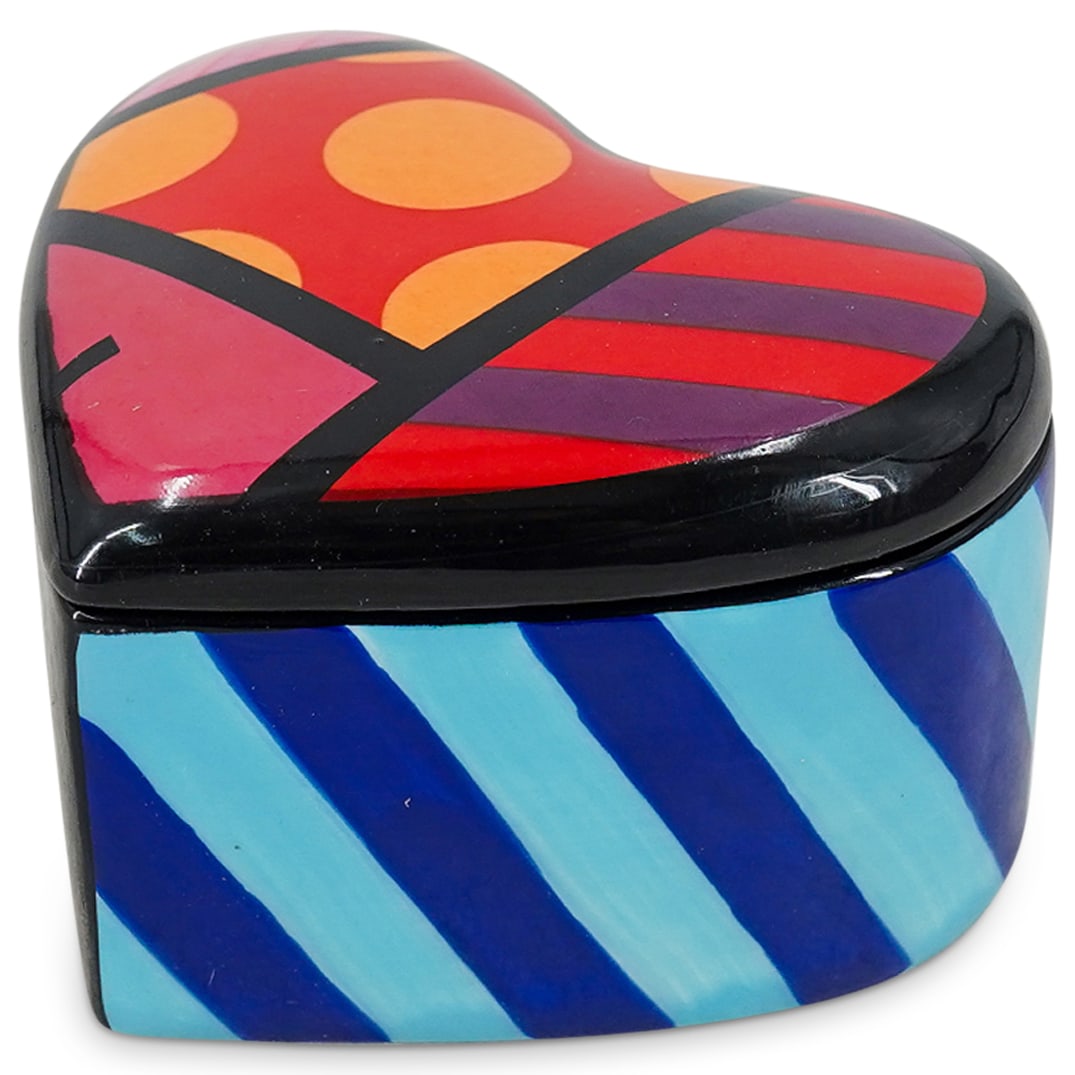 Britto Porcelain Heart-Shaped Trinket Box: DESCRIPTION: Britto porcelain trinket designs with a heart shape, featuring the iconic artwork of renowned pop-artist Romero Britto. Marked with Britto hallmark on the underside. With Romero Britto si