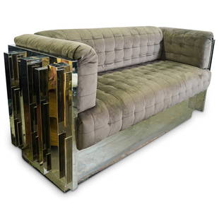 Paul Evans Style Chrome And Velvet Sofa: DESCRIPTION: Paul Evans Style sofa features a chrome "Cityscape" exterior displaying geometric patterns, completed with velvet cushion upholstery. CIRCA: Late 20th Cent. ORIGIN: USA DIMENSIONS: H: 31.