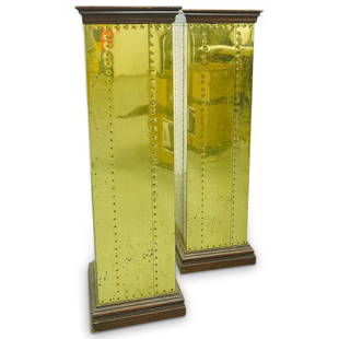 (2 Pc) Mid Century Wood & Brass Pedestals Set: DESCRIPTION: (2 Pc) Mid century wood and brass pedestals pair set designed with a square form, with wooden base and applied brass exterior. CIRCA: Mid 20th Century ORIGIN: Continental DIMENSIONS: H: 4