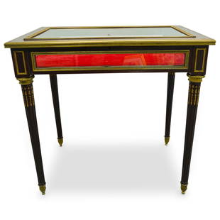 Fine 19th Cent. Louis XVI Style Vitrine Table Attrib. To Henry Dasson: DESCRIPTION: A fine 19th century Louis XVI style ormolu mounted vitrine table attributed to Henry Dasson (French, 1825-1896), with a beveled glass lift top, glass sides, red hued lined interior, and f