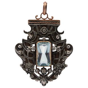 Faberge Carl Hahn 28ct Aquamarine and 14k Gold Pendant: DESCRIPTION: A Faberge pendant comprised of 14k gold with ornate silver overlay patterns, the pendant centered by a 28ct Aquamarine, encompassed by a series of rose cut diamonds amounting to approx. .