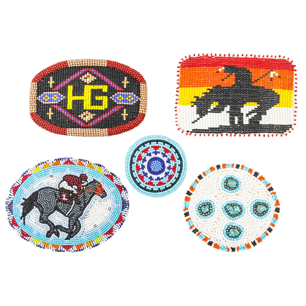 (5 Pc) Native American Style Beaded Belt Buckles: DESCRIPTION: A group of (5) Native American style beaded belt buckles feature the following: (1) Beaded buckle depicting a Native American atop a horse over a sunset backdrop. (1) Beaded buckle depict