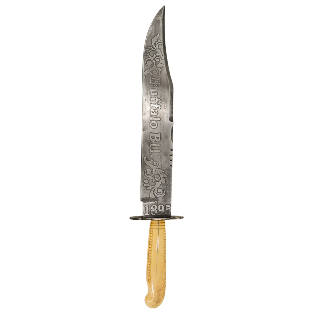 After Col. W.F. "Buffalo Bill" Cody Bone Handled Bowie Knife: DESCRIPTION: Antique steel bowie knife after Colonel William Frederick "Buffalo Bill" Cody featuring a carved faux bone handle and etched foliage on either side of the blade flanking Cody's name on on
