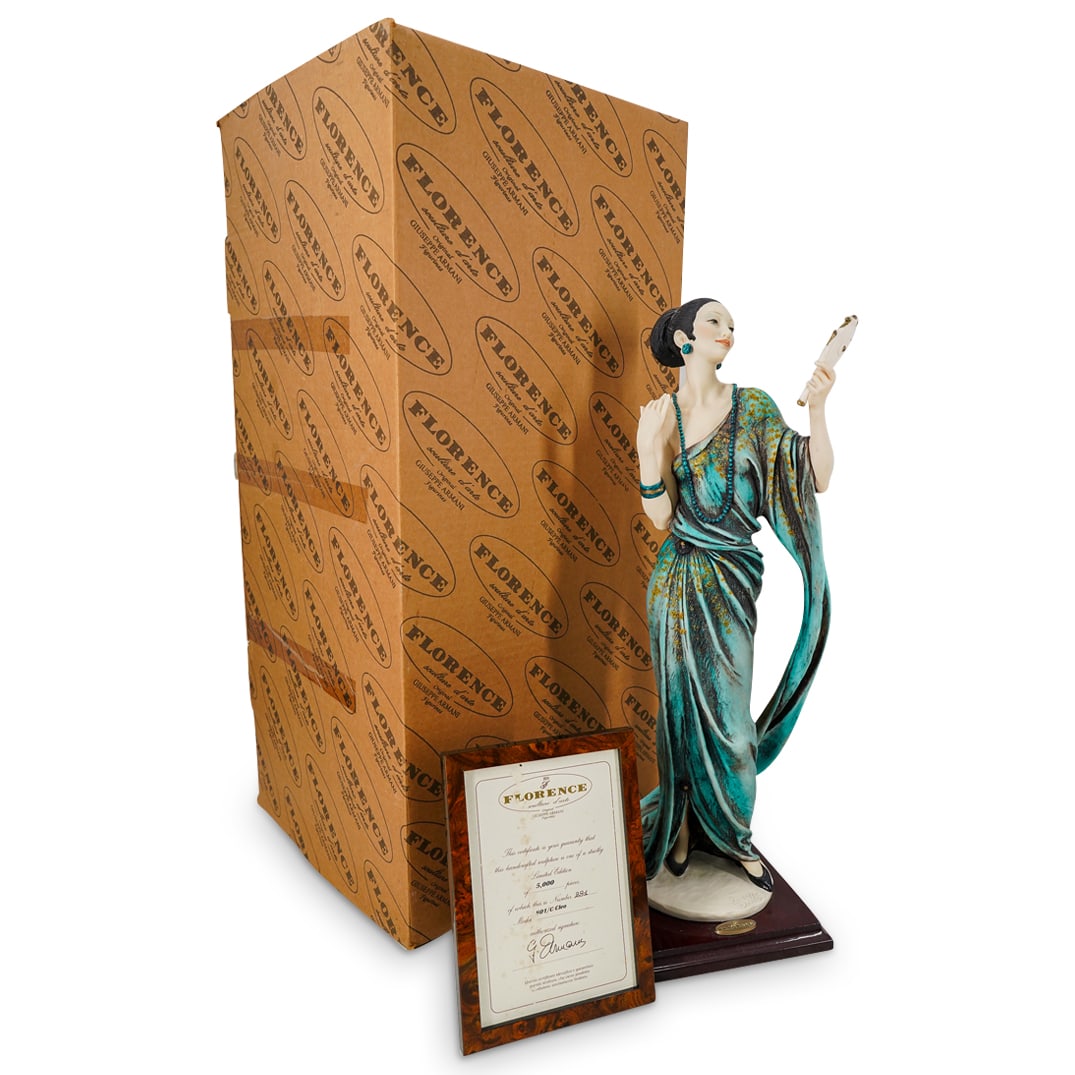 Limited Edition Giuseppe Armani "Cleo" Figurine: DESCRIPTION: A limited Edition Giuseppe Armani "Cleo" Figurine. Depicts an elegant lady with hand mirror. Model number 801C. Numbered 881/5000. Signed "Giuseppe Armani". With framed COA. CIRCA: 20th C