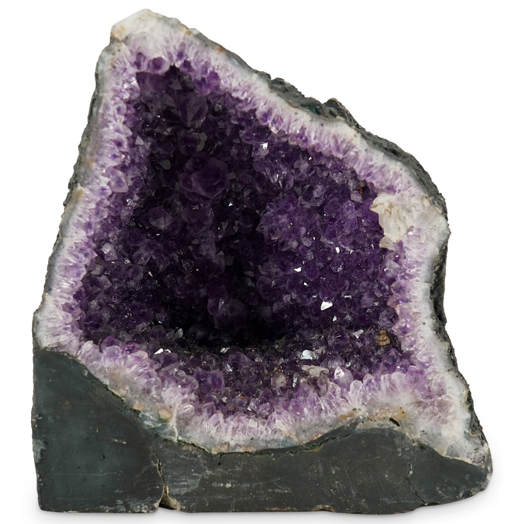 Amethyst Crystal Cathedral: DESCRIPTION: An amethyst crystal cathedral featuring polished border and comprised of amethyst crystals set into painted concrete. CIRCA: Early 21st century ORIGIN: Probably Brazilian DIMENSIONS: H: 9