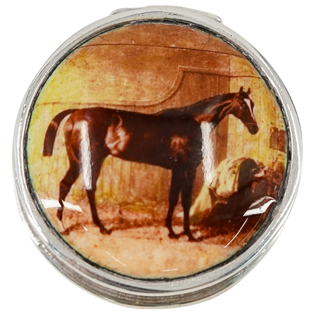 Sterling Silver Equestrian Pill Box: DESCRIPTION: Sterling pill box of circular form, embellished with an enameled lid with the motif of a horse. Stamped: "925" and LT. Total weight: 18 gts. CIRCA: 20th Century ORIGIN: Continental DIMENS