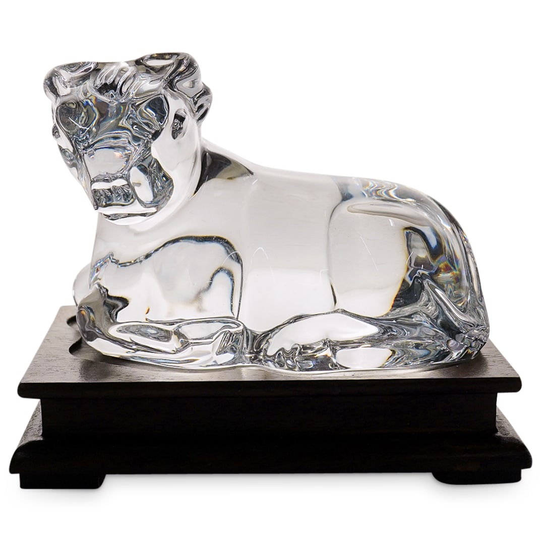 Baccarat Crystal Zodiac Cow Calf Figurine On Stand: DESCRIPTION: Baccarat Crystal Zodiac Cow Calf Figurine On Wood Stand. Marked with Baccarat hallmark on the underside. CIRCA: 1997 ORIGIN: France DIMENSIONS: Height: 2 3/4 in CONDITION: Good Condition 