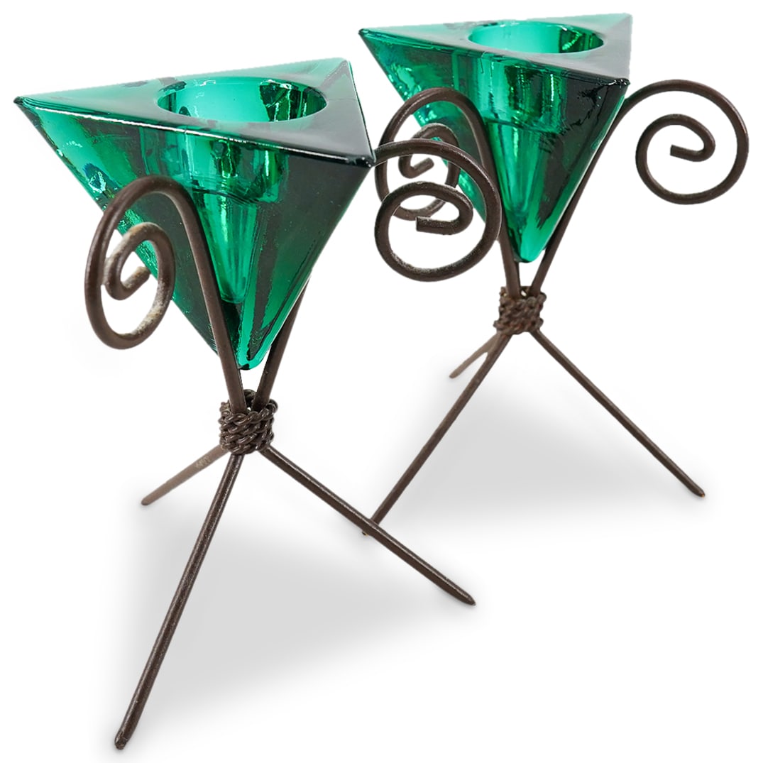 Zodax Iron & Glass Candle Holders: DESCRIPTION: A pair of Zodax candle holders with green tinted triangular moulded glass terminals, raised on tripod scrolling iron stands. Labeled: 'Zodax, Made In Portugal' CIRCA: 20th Cent. ORIGIN: P