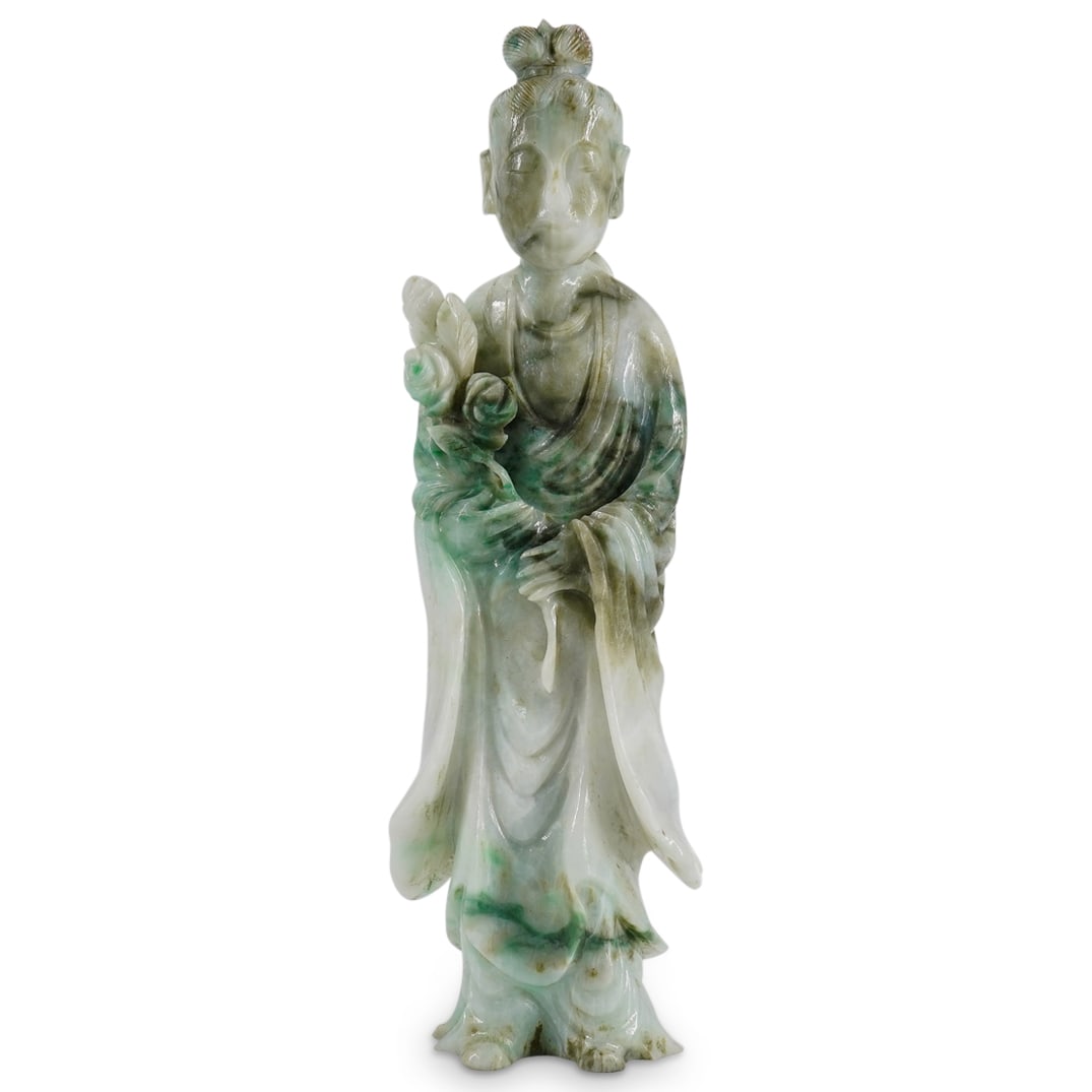 Chinese Carved Jadeite Figure Of A Lady: DESCRIPTION: Chinese carved jadeite figure of a lady holding flowers. CIRCA: 20th century ORIGIN: Chinese DIMENSIONS: H: 6" W: 2" Depth: 1.25" CONDITION: Great condition. Unless otherwise stated, all