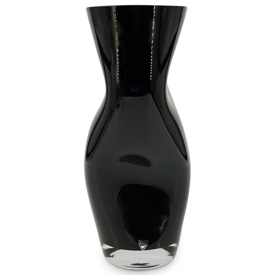 Sweden Orrefors Amorphic Black Art Glass Vase: DESCRIPTION: Sweden Orrefors Amorphic Black Art Glass Vase. With elongated form, and clear glass bottom. With Orrefors Sweden hallmark. CIRCA: 20th Century ORIGIN: Sweden DIMENSIONS: H: 13 1/2" W: 6 1