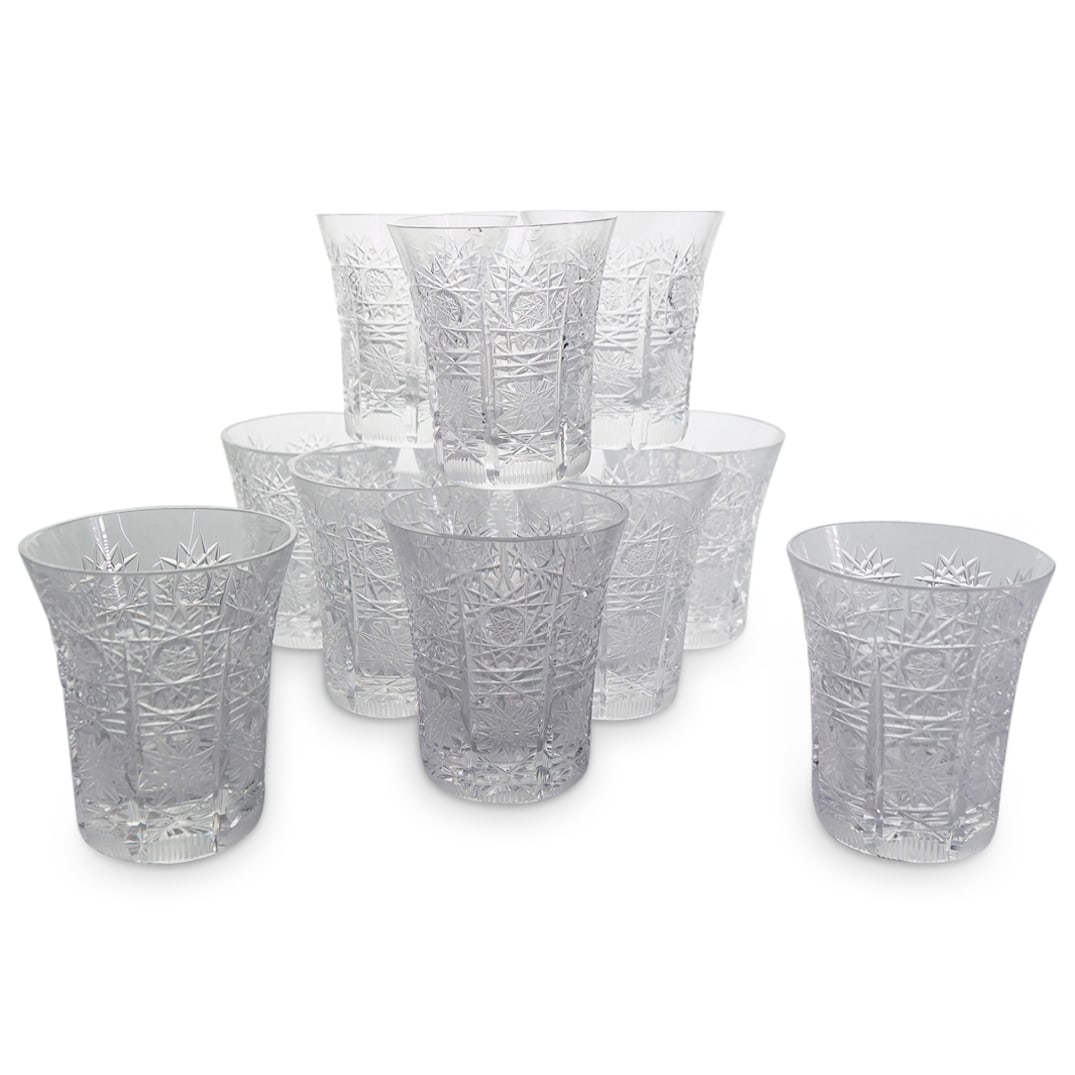 (11 Pc) Cut Glass Shot Glasses: DESCRIPTION: 11 cut glass shot glasses decorated with hobstar motifs. Apparently unmarked. CIRCA: 20th century ORIGIN: Unknown, probably Western DIMENSIONS: H: 2.5" Diameter: 2" CONDITION: Chips to ri