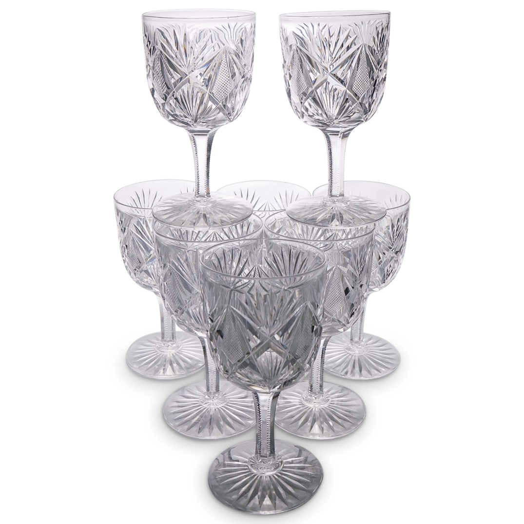 (8 Pc) Cut Crystal Wine Glasses: DESCRIPTION: Eight matching cut crystal wine glasses, each decorated with palm and diamond motifs and featuring a hexagonal stem. Apparently unmarked. CIRCA: 20th century ORIGIN: Western DIMENSIONS: H