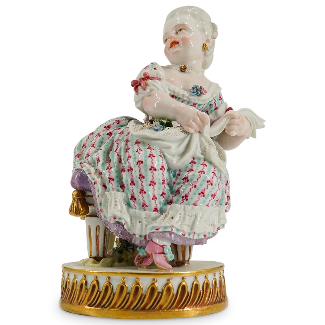Rare Michel Victor Acier Meissen Porcelain Figure Of Regal Girl: DESCRIPTION: A Rare Meissen porcelain figure model created by Victor Acier, the figure depicts a young regal girl sitting atop a stool, decorated with lavish jewelry polychrome dress. Marked along the