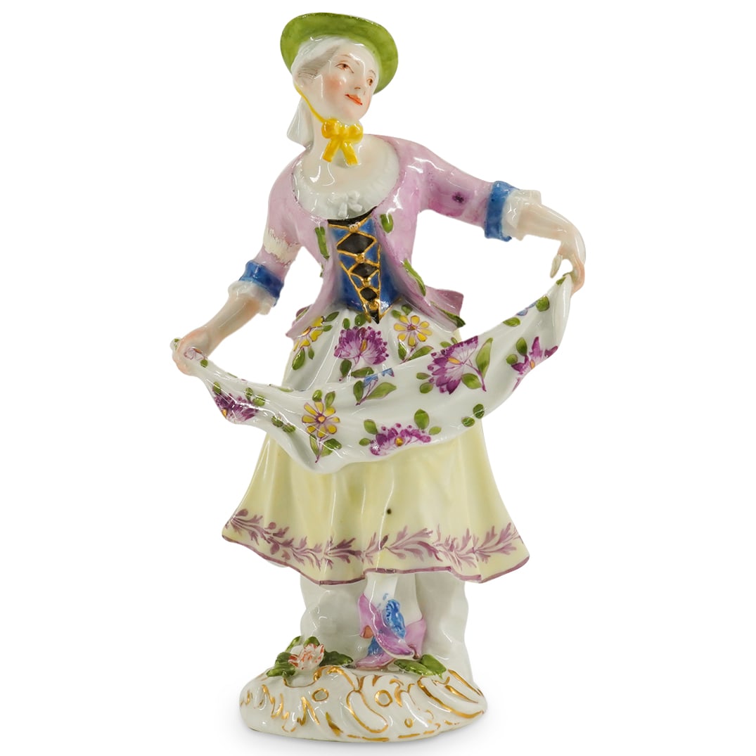 18th Cent. Meissen Porcelain Maiden: DESCRIPTION: an 18th cent Meissen porcelain figurine depicts a dancing maiden holding her dress at each end. Completed with floral patterns in polychrome and gilt finishes. Marked along backside with 