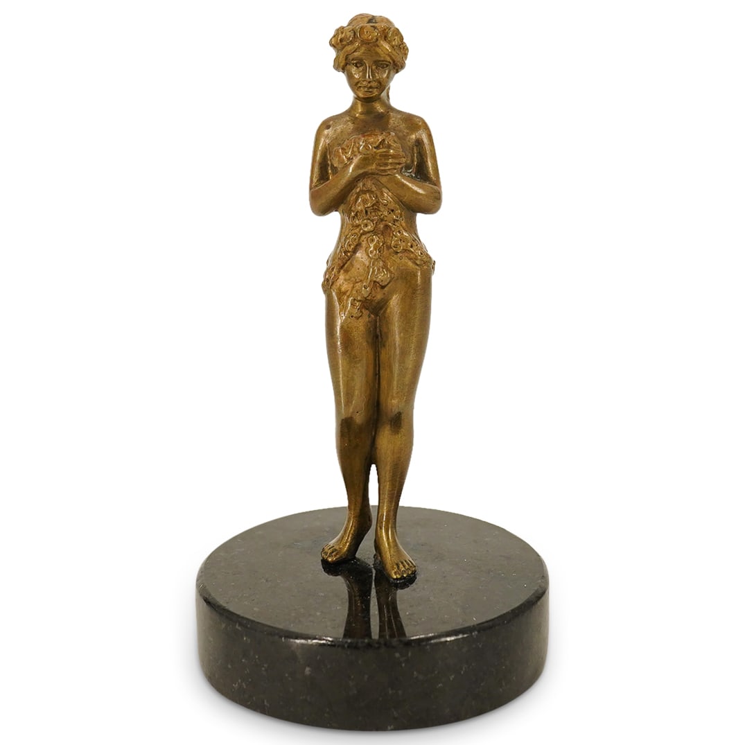 Antique Austrian Bronze of A Nude Lady: DESCRIPTION: Antique Austrian Bronze of A Nude Lady covering herself with floral vines, fitted atop a black stone base. CIRCA: Early 20th Cent. ORIGIN: Austria DIMENSIONS: H: 5.5" W: 3" CONDITION: Gre