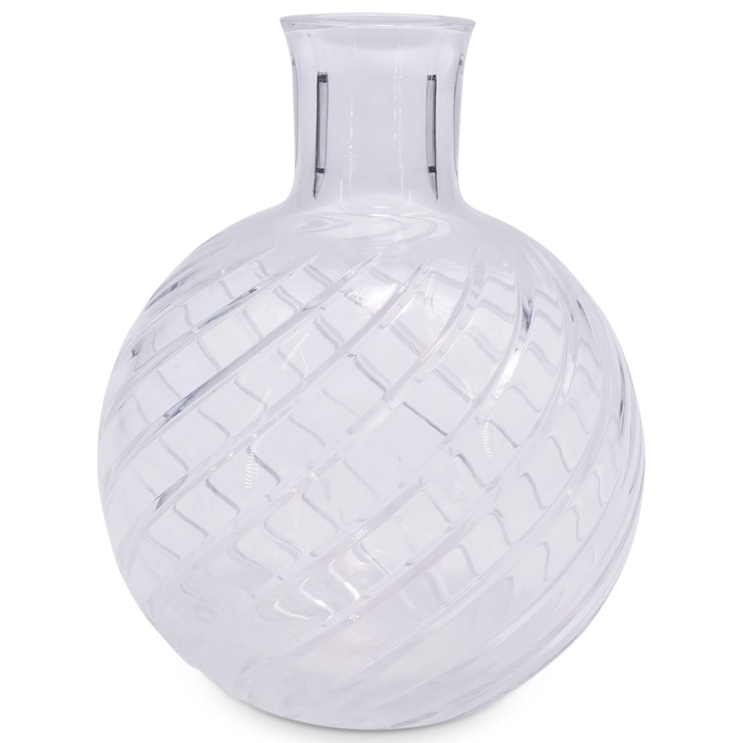 Baccarat "Cyclades" Crystal Bud Vase: DESCRIPTION: Baccarat "Cyclades" clear and colorless crystal bud vase featuring spherical body and curving motifs. Marked on underside. CIRCA: Late 20th century ORIGIN: French DIMENSIONS: H: 4.75" Dia