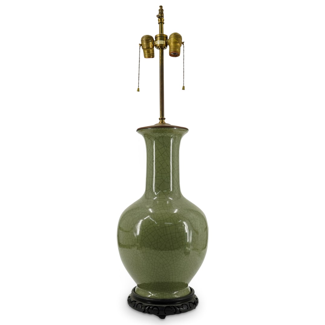 Chinese Celadon Porcelain Lamp: DESCRIPTION: Chinese celadon-glazed porcelain vase mounted as a two-light lamp. Tested; not currently functional. CIRCA: 20th century ORIGIN: Chinese DIMENSIONS: H: 33" Diameter: 10" CONDITION: Tested