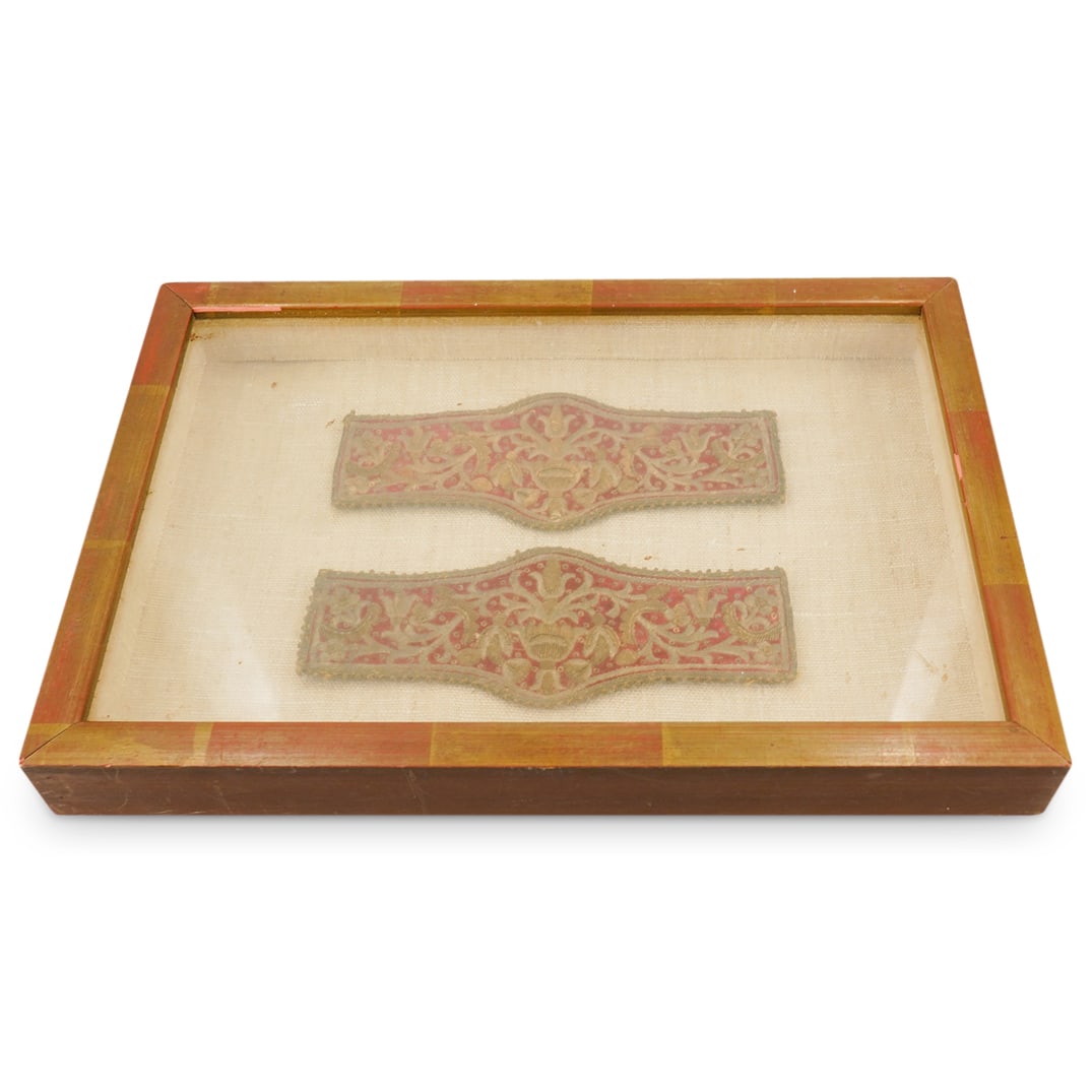 Antique Embroidered Ornaments: DESCRIPTION: Two antique embroidered ornaments, possibly meant for use on clothing, both mounted in a shadowbox and decorated with foliage motifs, metallic thread and sequins CIRCA: 19th century ORIGI