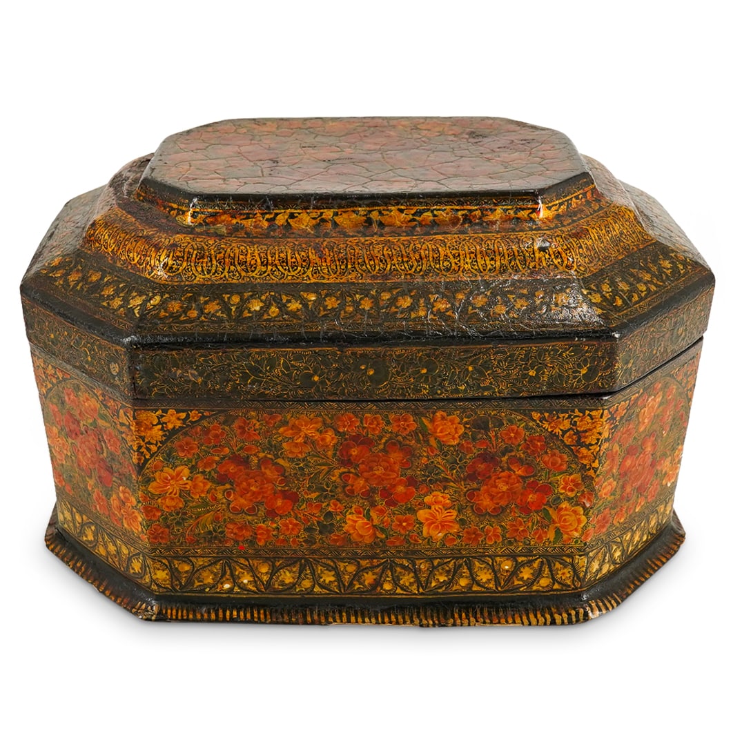 Lacquered Papier Mache Box: DESCRIPTION: Lacquered papier mache box decorated with floral and foliage motifs. CIRCA: Early 20th century ORIGIN: Asian, possibly Kashmiri DIMENSIONS: H: 6.75" W: 8.25" L: 11.5" CONDITION: Heavy res