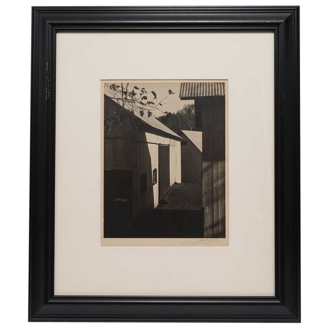 John Vanderpant (Dutch, 1884-1939) "Between Buildings" Photograph: DESCRIPTION: Silver bromide photograph print entitled "Between Buildings" by John Vanderpant depicting a monochrome image of the view of three buildings from a vantage point behind one of them. Mounte