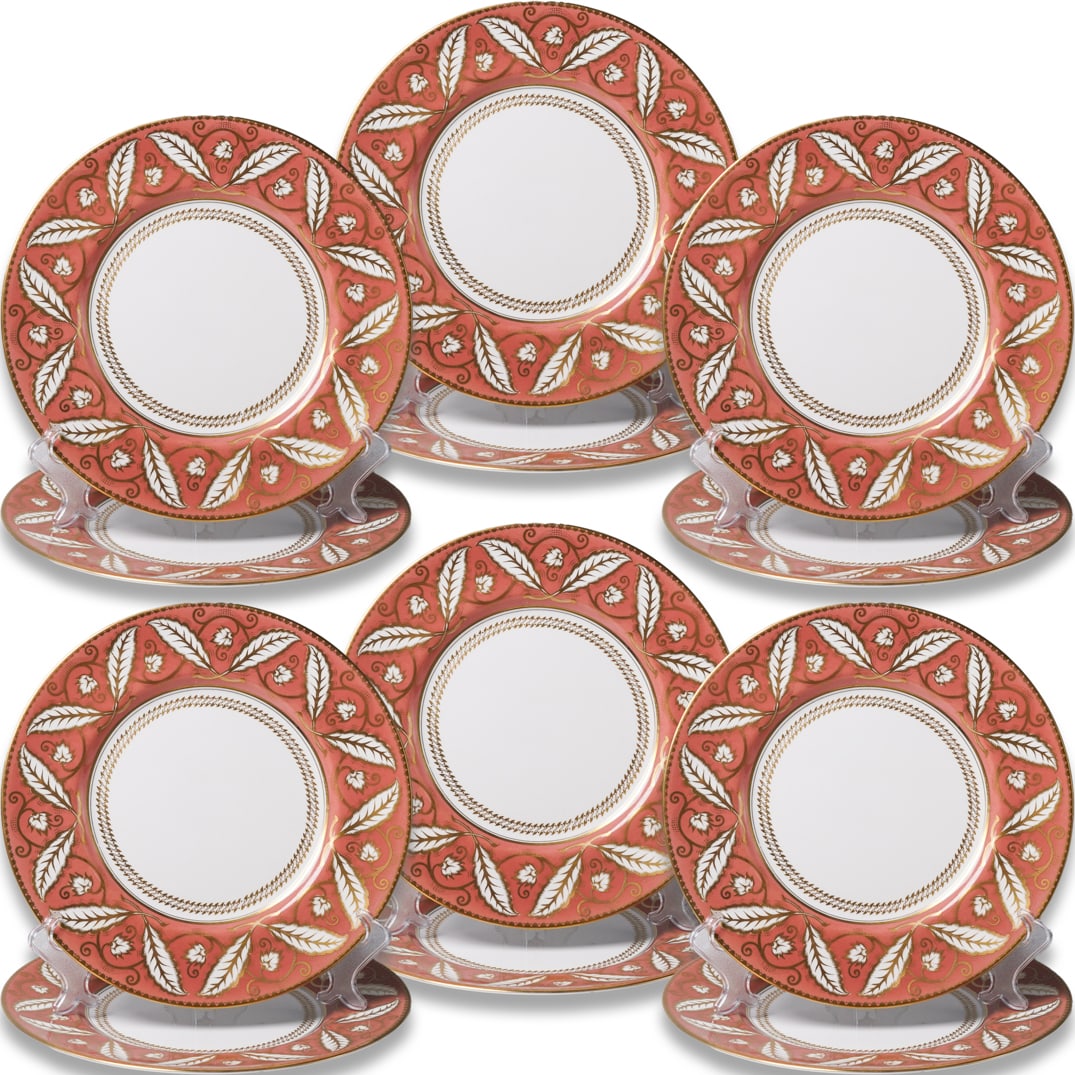 (12 Pc) Royal Worcester "Ettrick" Porcelain Dinner Plates: DESCRIPTION: 12 Royal Worcester porcelain dinner plates in the "Ettrick" pattern featuring foliage motifs, gilding, and a coral hue. Marked on underside, including with "Royal Worcester Bone China Mad