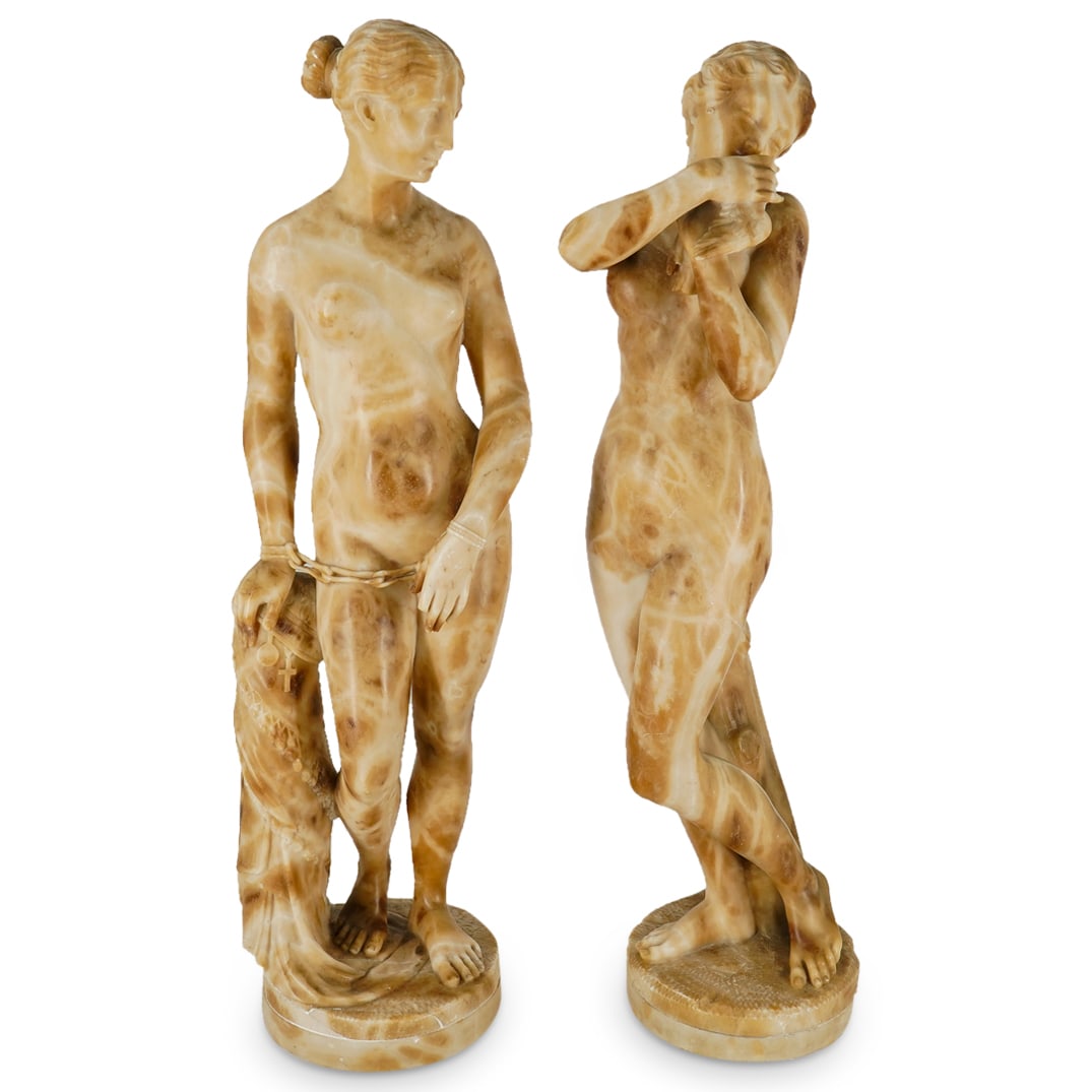 Pair Of 19th Century Neoclassical Carved Alabaster Nudes: DESCRIPTION: Two carved alabaster neo-classical nude statues: one of The Greek Slave after Hiram Powers, one of a woman kissing a songbird while leaning against a tree stump. CIRCA: 19th Century ORIGI