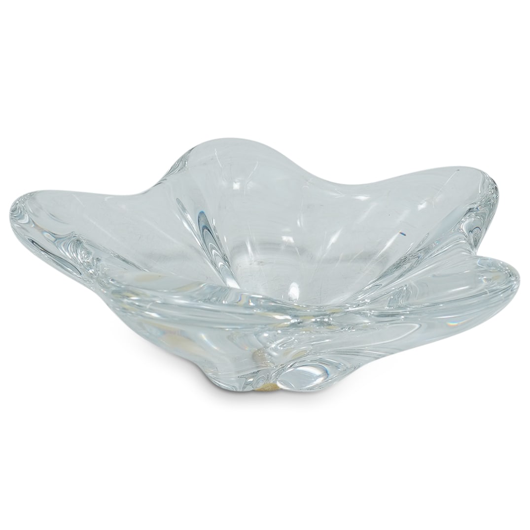 Baccarat Crystal Bowl: DESCRIPTION: Baccarat clear and colorless crystal bowl, suitable for use as a candy bowl or nut bowl. Marked on underside. CIRCA: Late 20th - early 21st century ORIGIN: French DIMENSIONS: H: 2" L: 6.5
