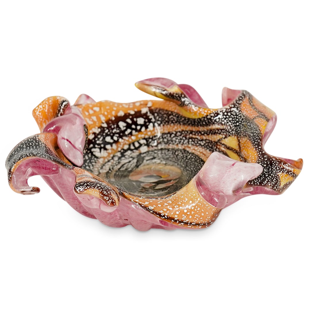 Murano Art Glass Swirl Bowl: DESCRIPTION: Murano art glass swirl bowl, with a pink ground embellished with abstracted polychrome decorations in yellow, orange and brown hues, further embellished with silvered sparkles. Marked wit