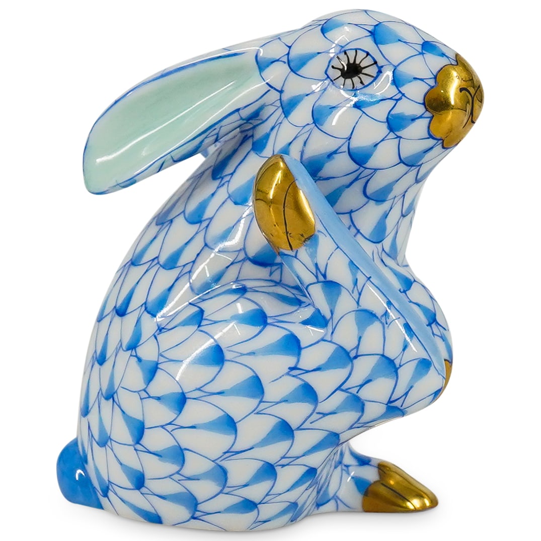 Herend Porcelain "Scratching Bunny" Blue Fishnet Figurine: DESCRIPTION: Herend porcelain figurine depicting a "Scratching Bunny" and featuring blue fishnet pattern and gilded accents. Style number: #15387. Marked with Herend hallmark on the underside. CIRCA: 