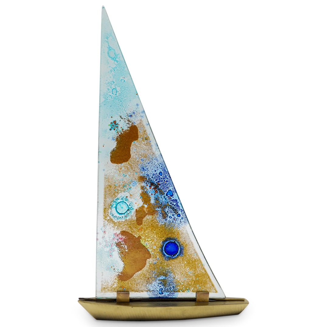 Art Glass & Brass Sailing Boat Sculpture: DESCRIPTION: Art Glass & Brass Sailing Boat Sculpture. Depicts a brass hull and a glass sail with abstracted decorations. CIRCA: 20th Century ORIGIN: Continental DIMENSIONS: H: 18" W: 10" CONDITION: G
