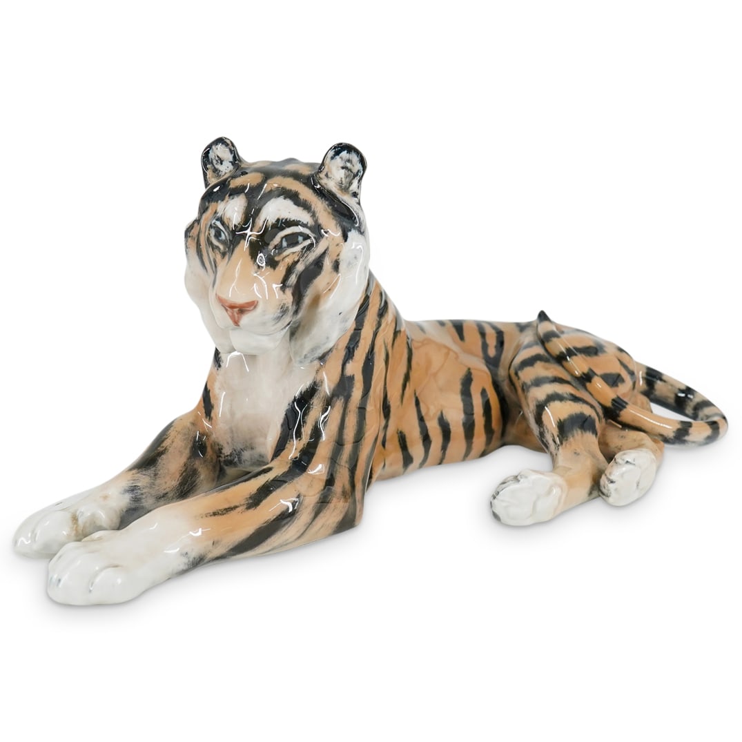 Royal Copenhagen "Tiger" Porcelain Sculpture: DESCRIPTION: A Royal Copenhagen "Tiger Lying Down Resting" glazed porcelain animal sculpture, model number #714, by designer Lauritz Jensen. With high gloss finish. Marked with Royal Copenhagen hallma