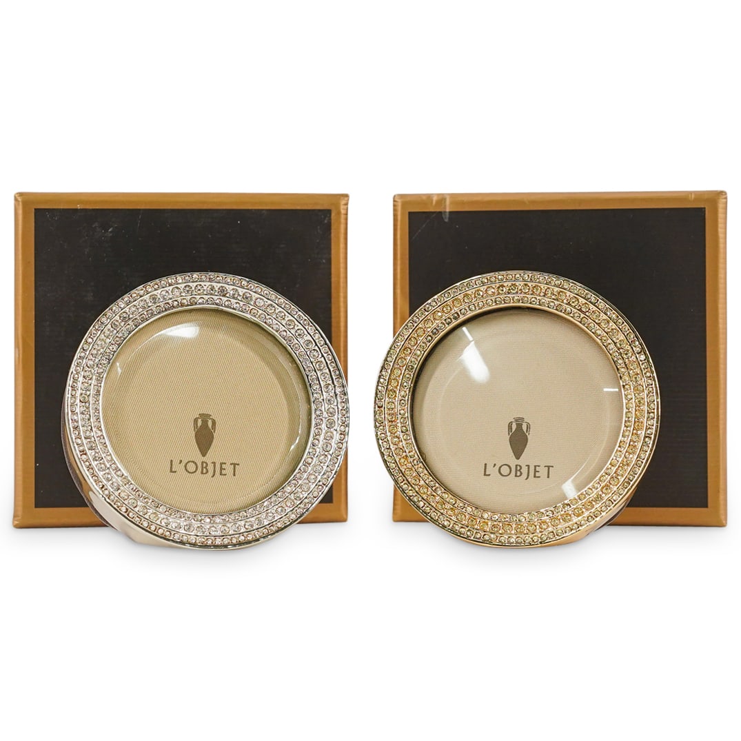 (2 Pc) L'Objet Picture Frames: DESCRIPTION: Two L'Objet picture frame, each decorated with crystals. Includes two boxes and two dust bags. CIRCA: Early 21st century ORIGIN: Unknown DIMENSIONS: (Sight) Diameter: 2" (Frame) Diameter: