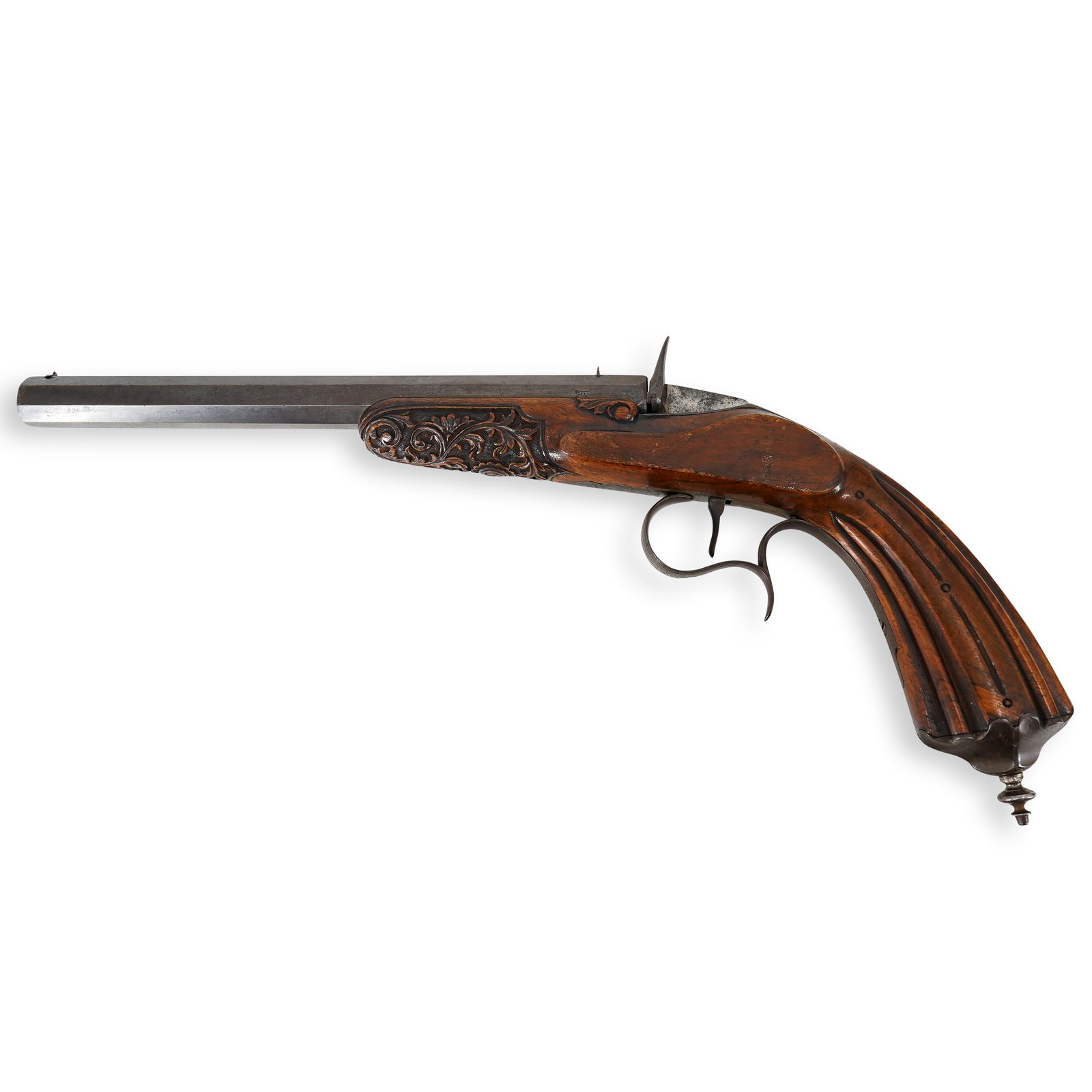 Antique Carved Wood Stock Pistol: DESCRIPTION: Antique pistol featuring an ornately carved grip featuring flowers and foliage beneath the barrel and a finial at the end of the grip. Untested. CIRCA: 19th Century ORIGIN: USA DIMENSIONS