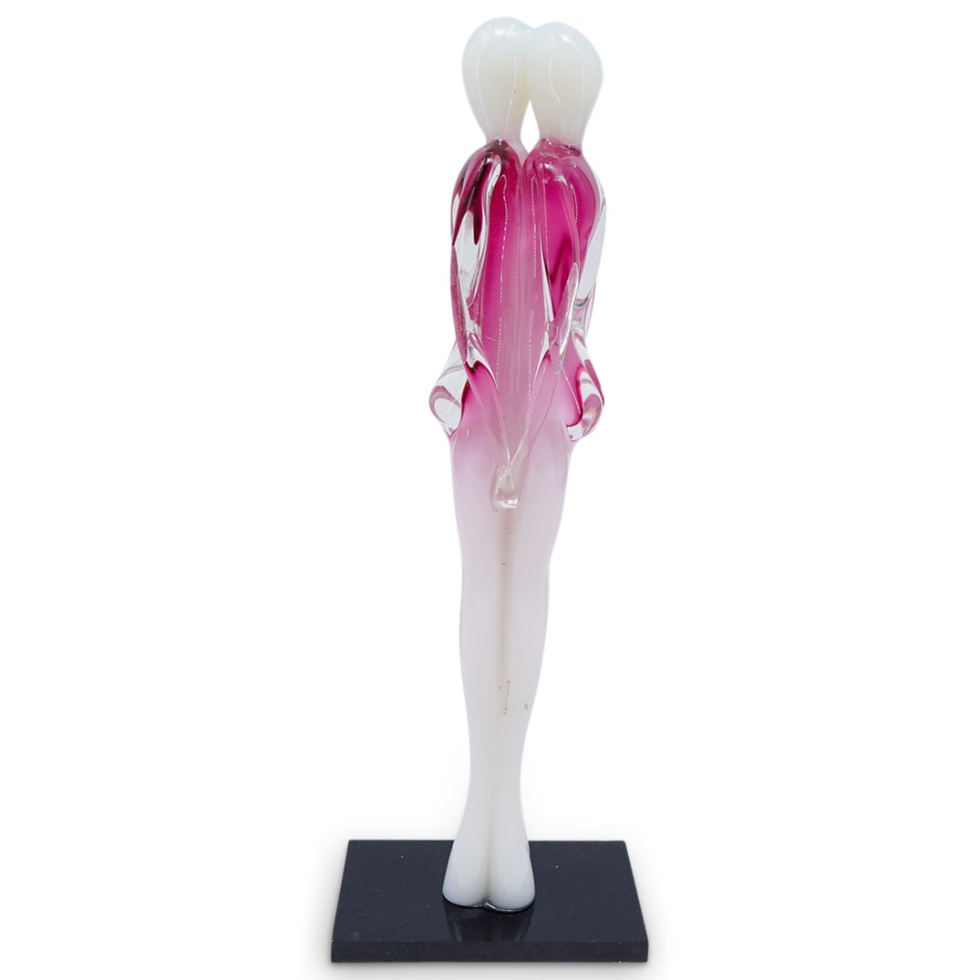 After Renato Anatra Murano Art Glass "Lovers" Sculpture: DESCRIPTION: After Renato Anatra Murano art glass "Lovers" sculpture. Features a white and magenta glass with sommerso clear exterior, depicting a couple embracing one another. Standing on a rectangul