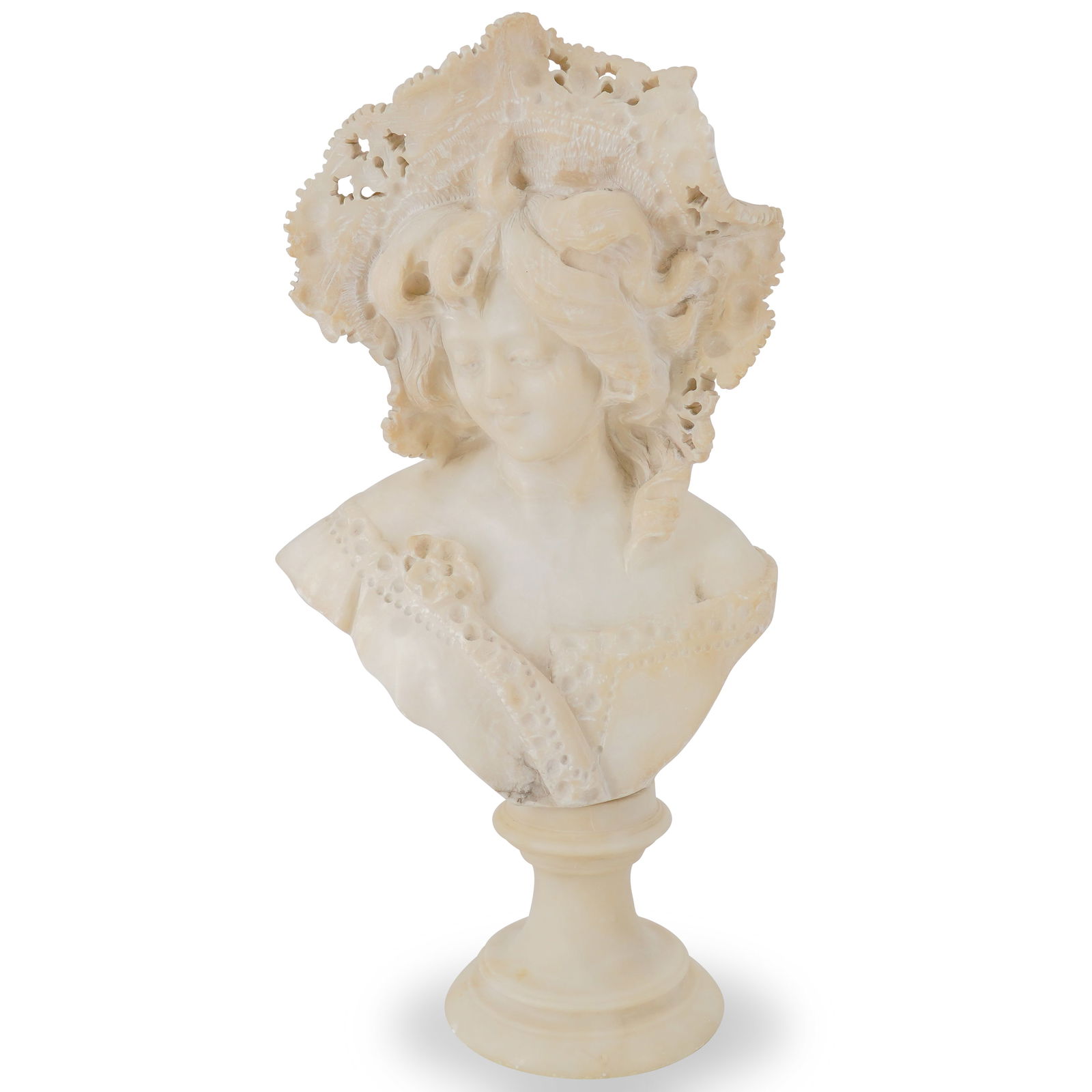 Carved Alabaster Bust Of A Young Woman: DESCRIPTION: Carved alabaster bust depicting a young woman, her hat partially pierced, the bust resting atop an alabaster base. CIRCA: Late 19th - early 20th century ORIGIN: Western DIMENSIONS: H: 15.