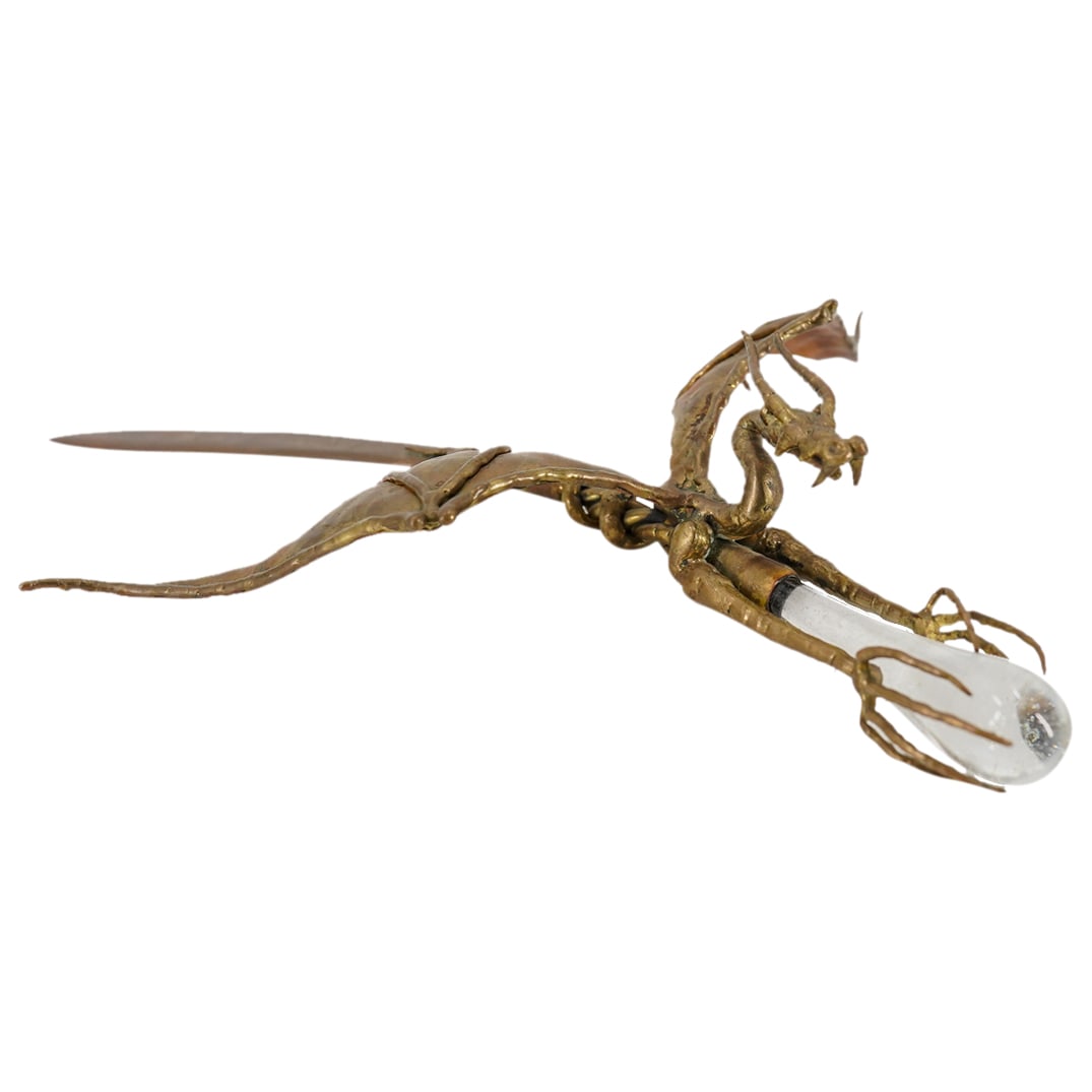 Mixed Metal & Glass Wyvern Letter Opener: DESCRIPTION: Mixed metal & glass letter opener depicting a wyvern, its tail wrapping around the blade and its claws grasping the colorless glass handle. CIRCA: Early 21st century ORIGIN: Unknown DIMEN