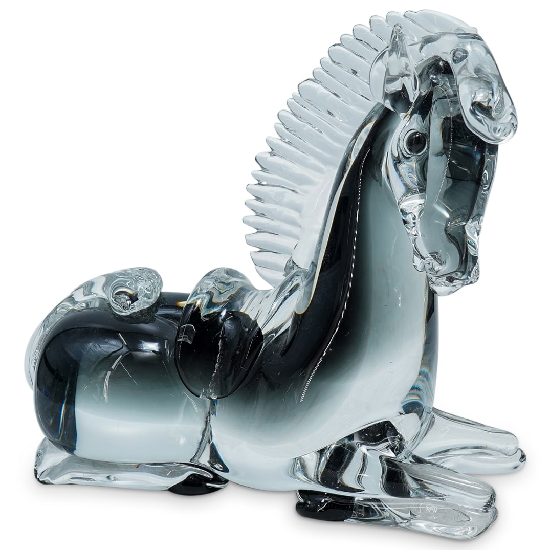 Murano Glass Horse Sculpture: DESCRIPTION: Signed glass sculpture of a recumbent horse. Marked with "Campanella" on underside. CIRCA: Late 20th - early 21st century ORIGIN: Italian DIMENSIONS: H: 7.75" L: 9" CONDITION: Moderate sc