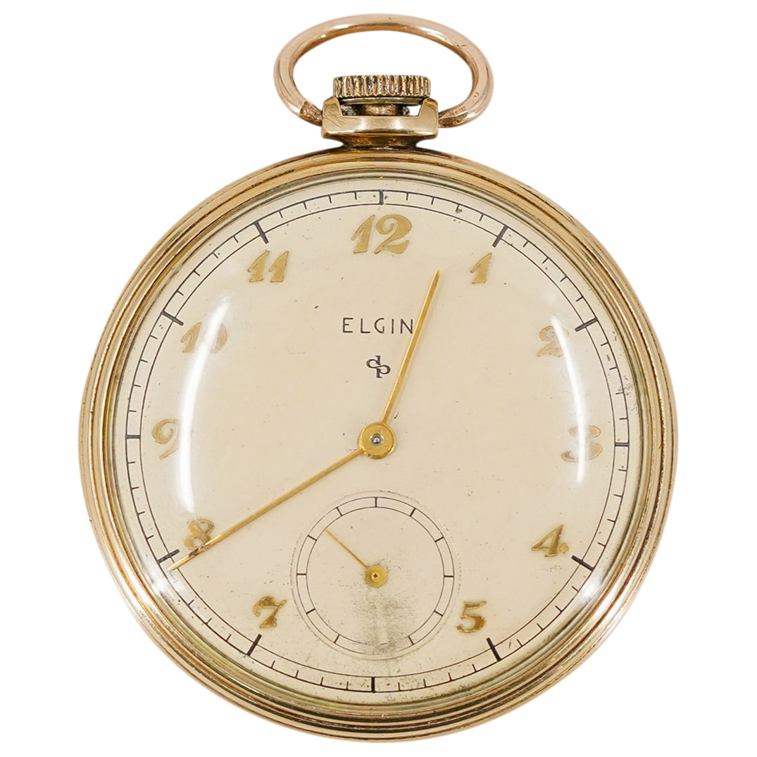 Antique Elgin National Watch Co. 10K Gold-Filled Pocket Watch: DESCRIPTION: Antique Elgin National Watch Co. 10K Gold-Filled Pocket Watch. 15 jewels. With beige dial and gold tone Arabic numerals. Numbered U591876. Marked Elgin 546 USA and 90899. CIRCA: 1940s. OR