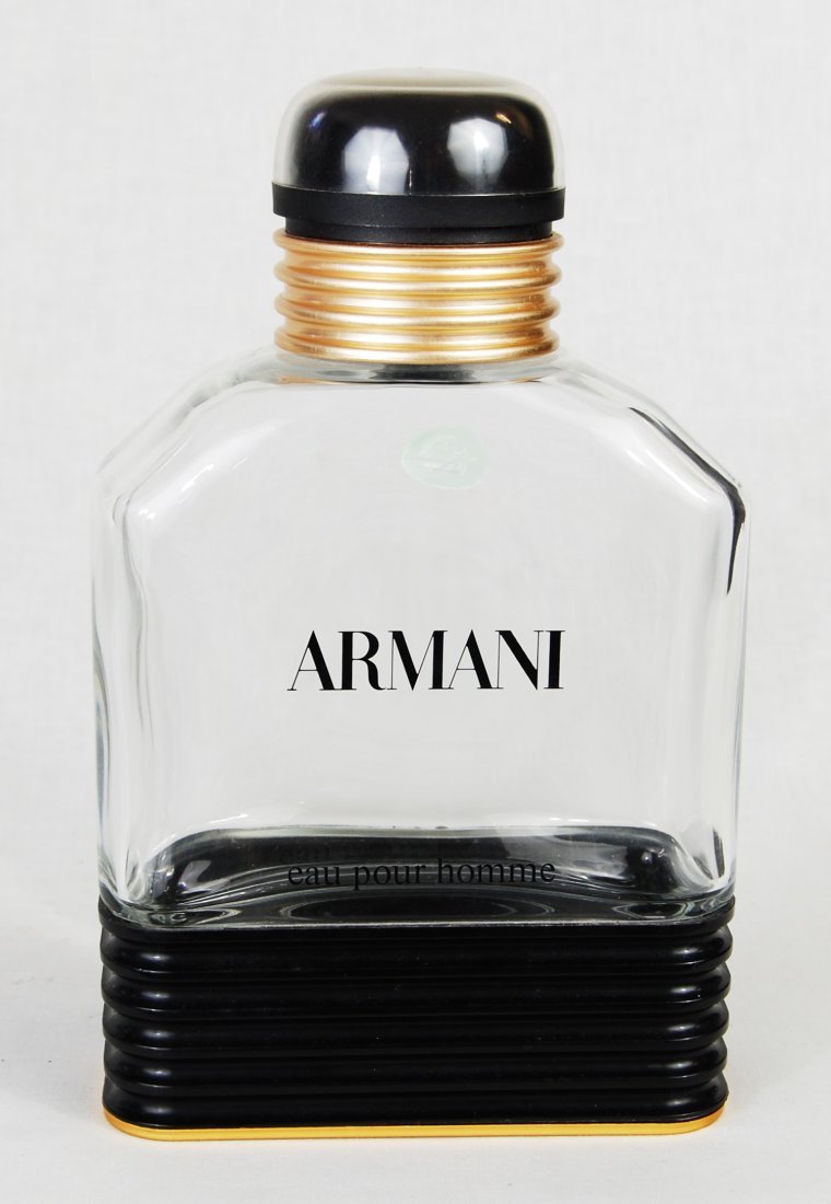 Large Vintage Armani glass decorative perfume bottl: DESCRIPTION: Very large Armani perfume bottle. Decorative fashion bottle. Marked on bottom" Made in France, 100ml-33.3 FL OZ , Georgio Armani Paris" CIRCA: 1970's-1980's ORIGIN: DIMENSIONS: