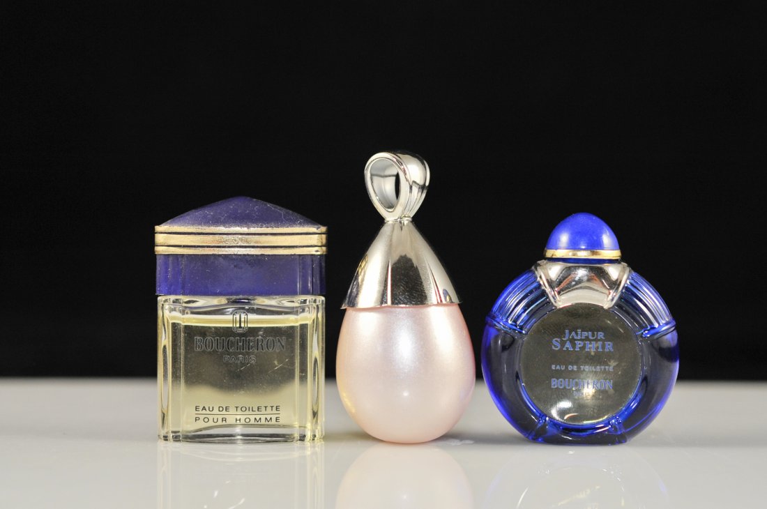 Set of three Boucheron mini fragrance bottles: DESCRIPTION: Three miniature Boucheron perfume bottles. Different scents in each bottle. "Jaipur Saphir" by Boucheron, "Initial" by Boucheron, and "Boucheron" by Boucheron. All bottles are full CIRCA: