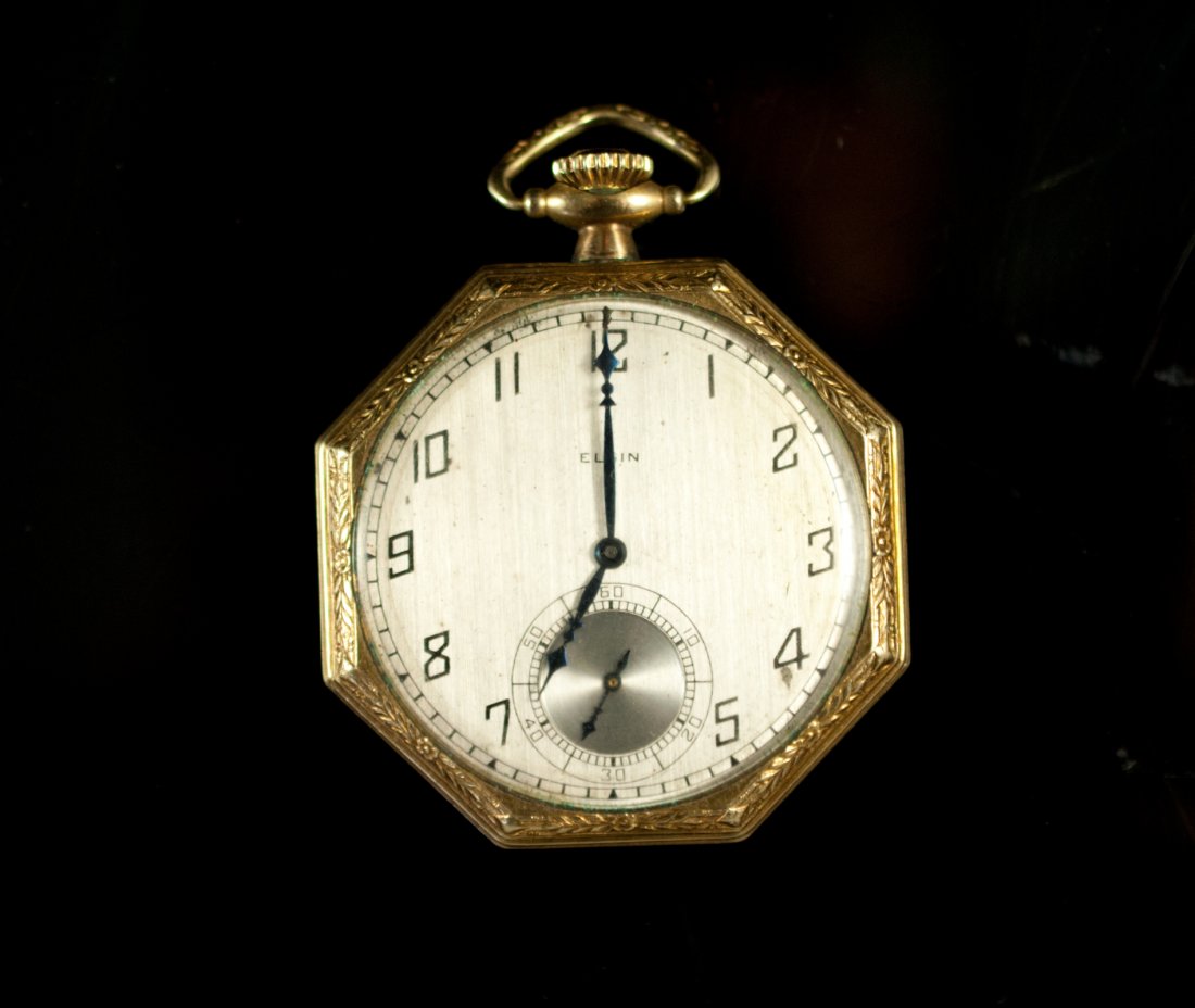 Early 1900's Elgin pocket watch. Works perfect: DESCRIPTION: Early 1900's Elgin pocket watch. Features an eight sided gold filled case, secondhand sub dial and original crown. Face is in good condition. Works perfect CIRCA: 1920's-1930's ORIGIN: US