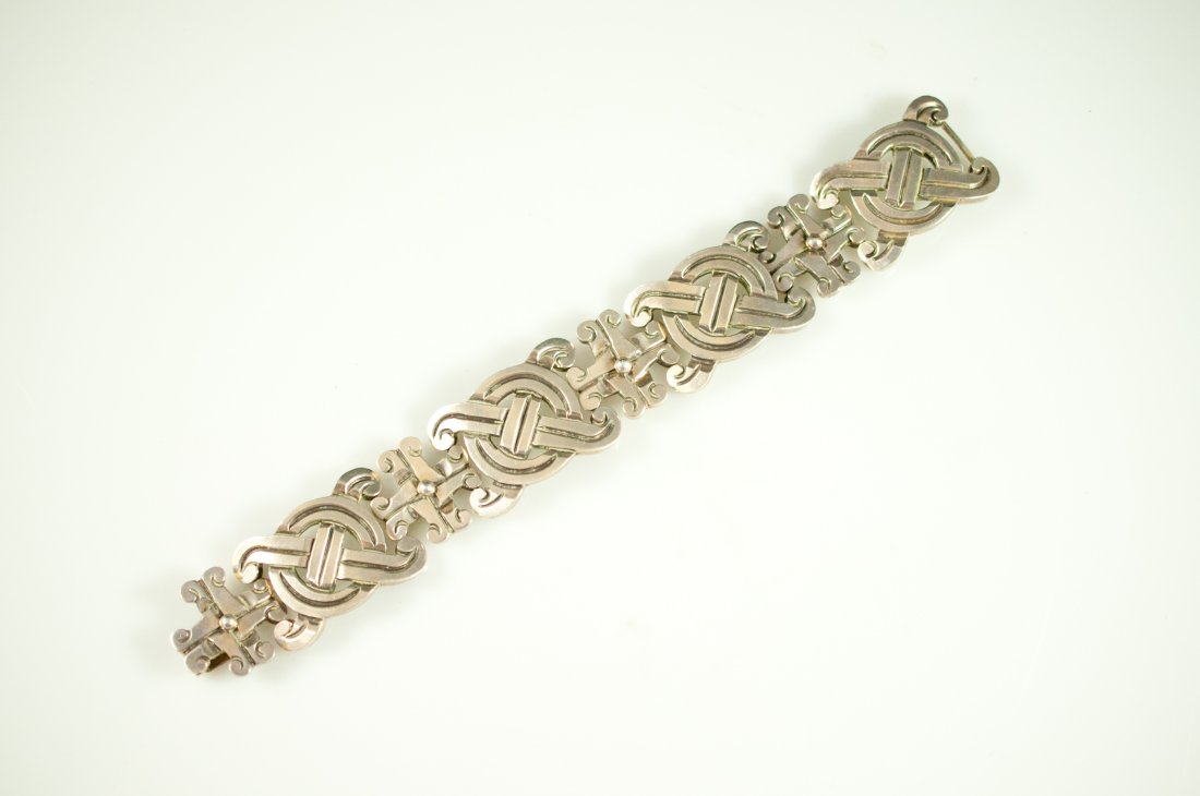 William Spratling Mexican sterling bracelet. Hallm: DESCRIPTION: William Spratling sterling Mexican bracelet. Unique hand done design with engraved tribal lines and raised balls on each link. Classic Spratling. Very heavy. Hallmarked on back "William S