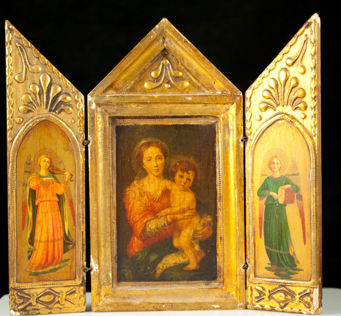 Italian hand painted enclosed religious icon: DESCRIPTION: Italian hand painted icon. Made from wood and gesso with a gold leaf patina. It opens to reveal three hand painted scenes. An angel playing the violin, an angel playing a drum and the cen